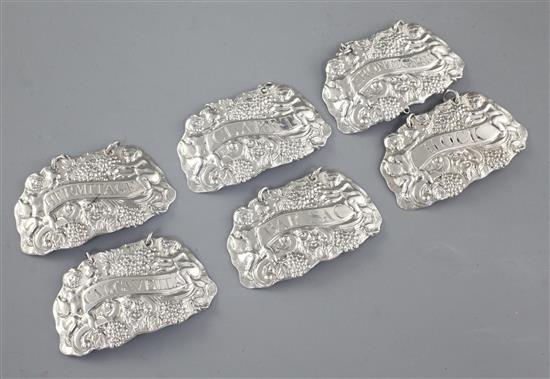 A rare set of six Irish George III silver wine labels, by John Townsend?, Width of each 60mm Total weight: 2.1oz/68grms